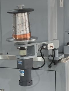 wire take up device